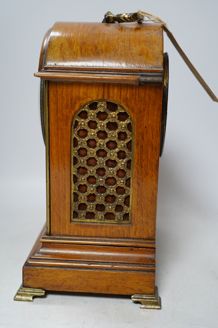 A 19th century mahogany eight day mantel clock with enamel dial and pendulum, 30cm high. Condition - fair, not tested